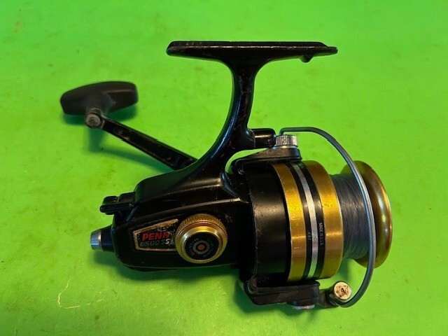 VINTAGE PENN SPINFISHER 6500SS SPINNING FISHING REEL LOOKS AND WORKS VERY GOOD