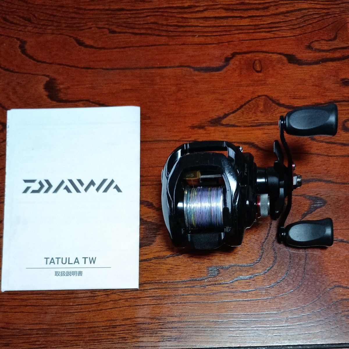 Daiwa TATULA TW Bait Reel with Instruction