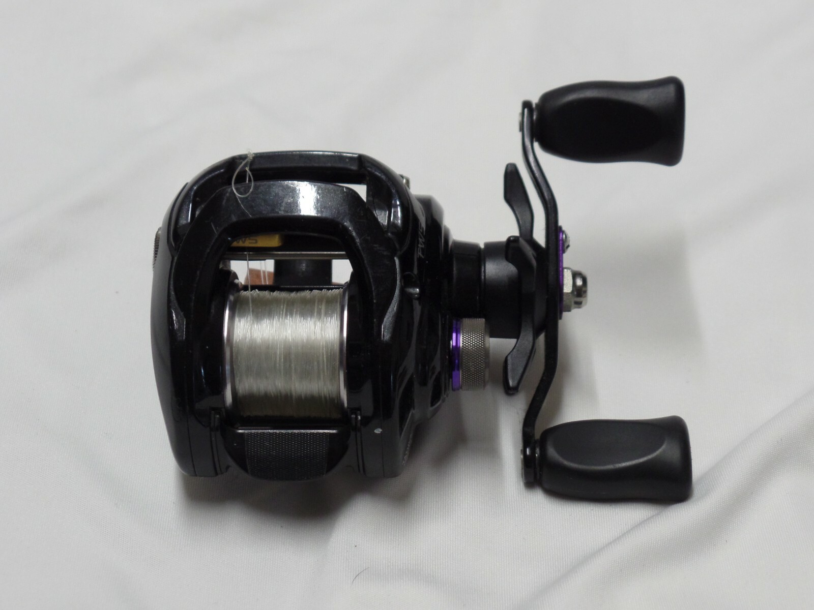 diawa tatula 103XH-TW5 works great spooled with florocarbon no box right hand