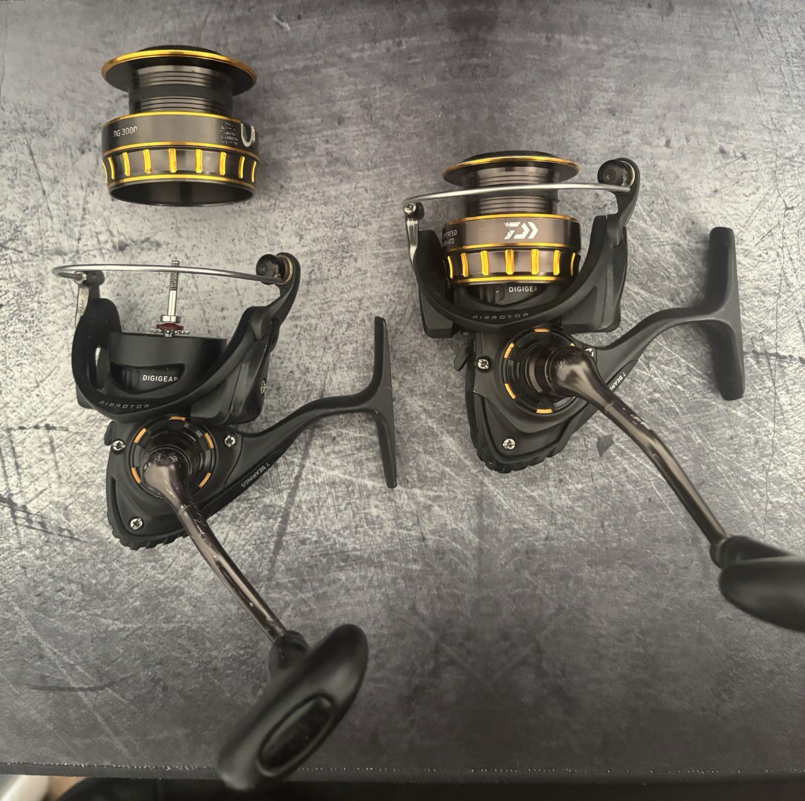 2 Daiwa BG 2500 Spinning Reels And Daiwa BG 3000 Spool